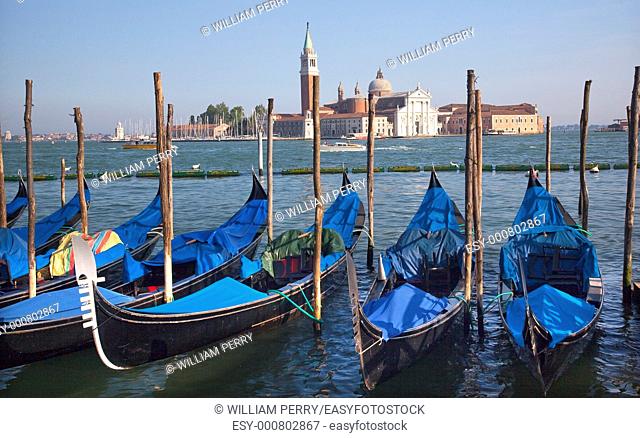 San Giorgio Maggiore Church and Bell Tower Blue Gondolas Grand Canal Venice Italy  Resubmit-In response to comments from reviewer have further processed image...