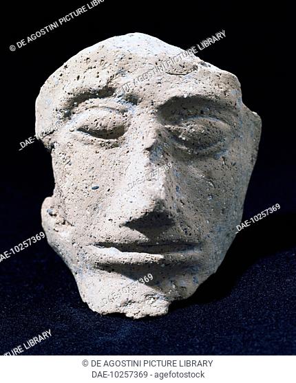 Terracotta male head, from the Necropolis of Marzabotto, Emilia Romagna, Italy. Etruscan civilisation.  Marzabotto, Museo Nazionale Etrusco Pompeo Aria...