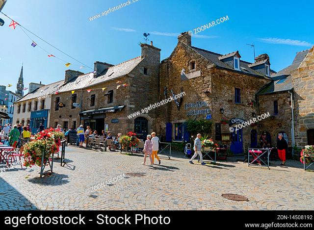 Le Conquet, Finistere / France - 22. August, 2019: view of the busy town square in La Conquet with many tourists visiting