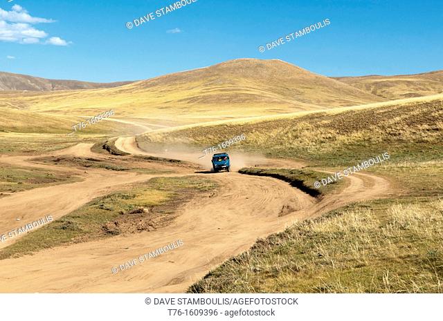 truck traveling through the Orkhon River Valley of Central Mongolia