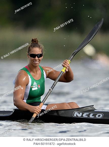 Hungarian canoeist Tamara Csipes cheers after the women's 1000 meters heat on Lake Beetzsee in Brandenburg and der Havel, Germany, 12 July 2014