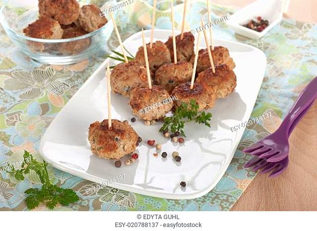 Freshly fried meat balls on a plate