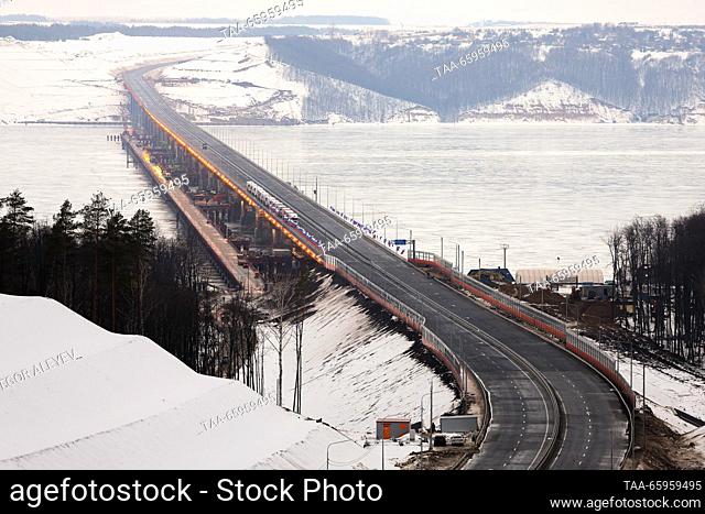 RUSSIA, REPUBLIC OF TATARSTAN - DECEMBER 21, 2023: A view of a bridge over the Volga River on M12 Highway. The distance of 810km from Moscow to Kazan can be...