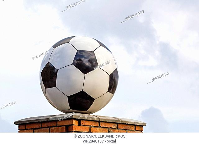 Soccer ball made of marble, decorative architectural element