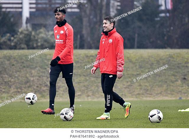 The new player of Mainz 05 Bojan Krkic Perez partakes in a traning session with teammate Aaron Seydel (L) in Mainz, Germany, 30 January 2017