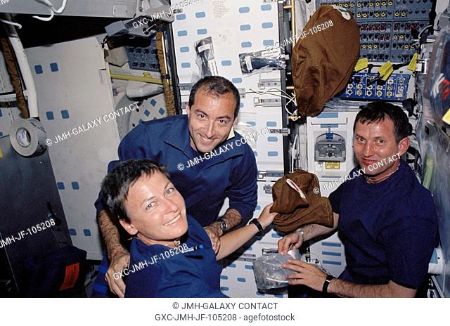 Astronauts Peggy A. Whitson (foreground), Expedition Five flight engineer; Philippe Perrin, STS-111 mission specialist; and cosmonaut Sergei Y