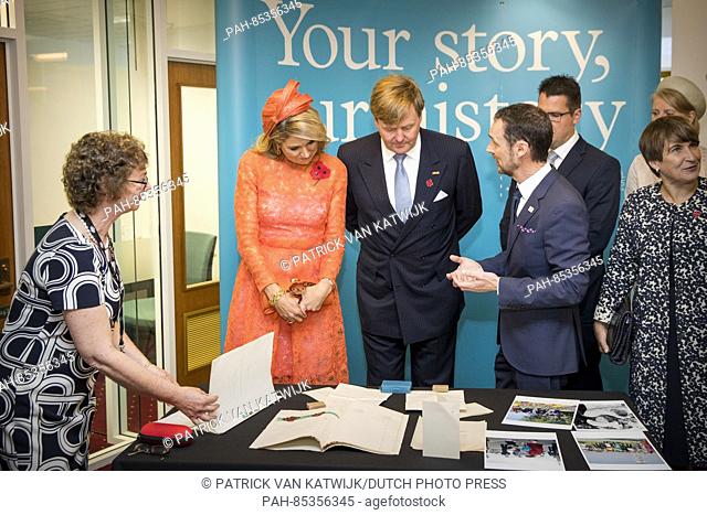 King Willem-Alexander and Queen Maxima of The Netherlands visit the National Archives of Australia welcomed by Director General David Fricker in Canberra