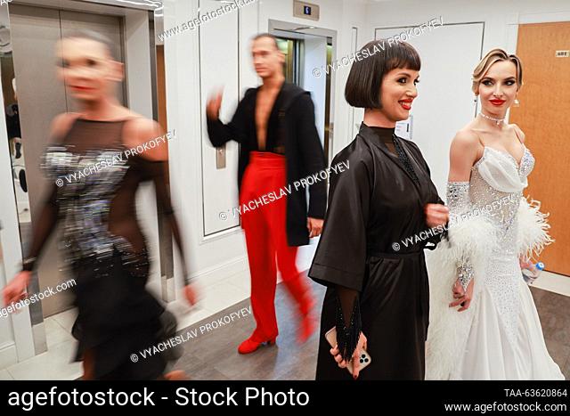 RUSSIA, MOSCOW - OCTOBER 21, 2023: Dancers warm up before the ""Kremlin Cup - Pride of Russia!"" dancing tournament at the State Kremlin Palace