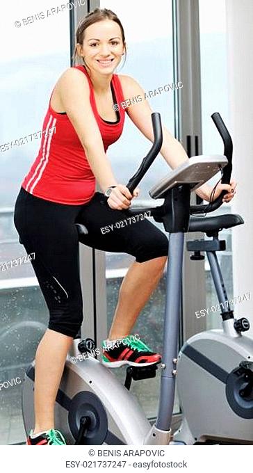 woman workout in fitness club on running track