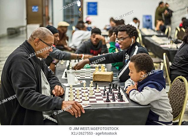 Detroit, Michigan - Members of the Detroit City Chess Club play chess in Prentis Court at the Detroit Institute of Arts