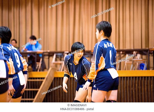 High School Girls Playing Volley Ball