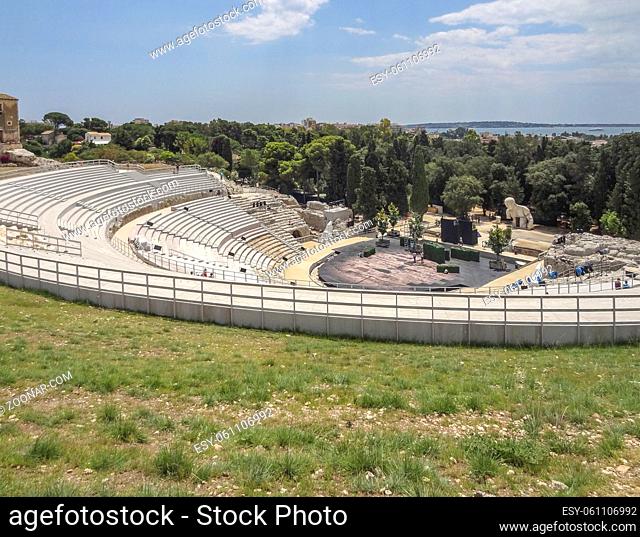 ancient greek amphitheatre located around Syracuse, a city in Sicily, Italy