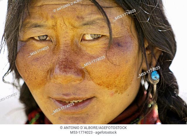A portrait of tibetan woman  Darchen  Ngari Prefecture  Tibet province  China  Asia