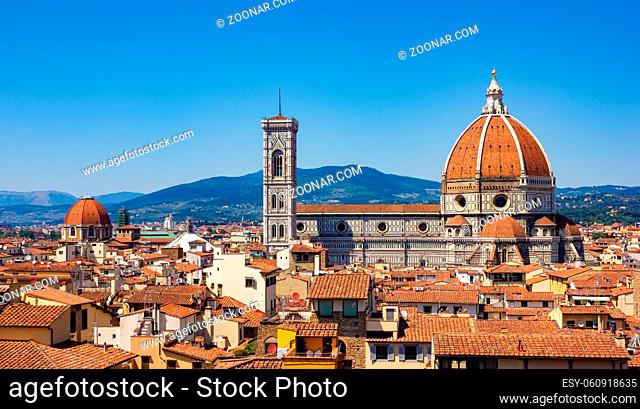 A picture of the Cathedral of Santa Maria del Fiore above Florence's rooftops