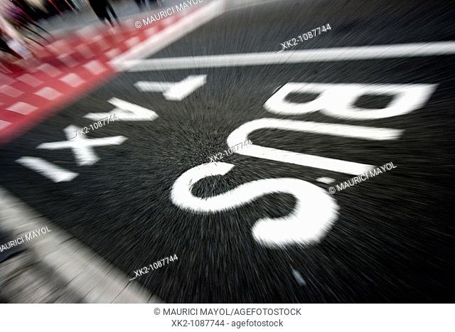Blurred sign of taxi and bus lane