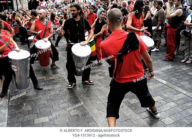 Batucada. The percussion group Samba da rua performing in the streets of Llanes during the festival of San Roque 2011