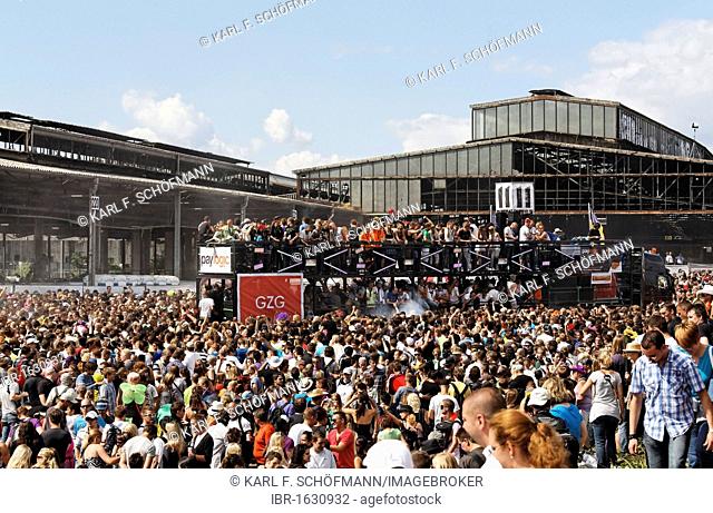 Crowds outside the derelict buildings of an old freight depot, Loveparade 2010, Duisburg, North Rhine-Westfalia, Germany, Europe