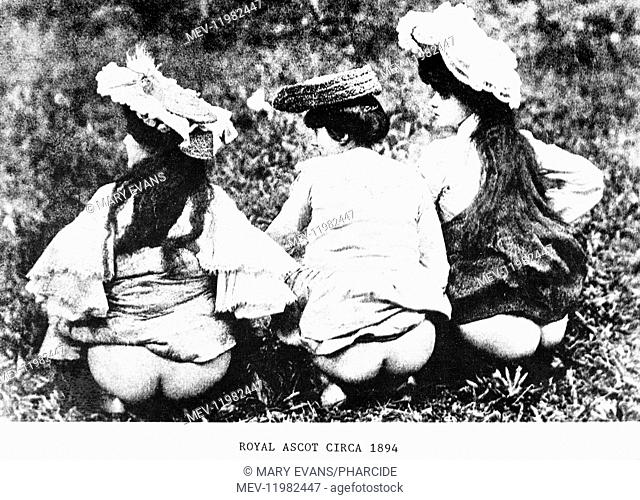 Three young Victorian women baring their bottoms, circa 1894