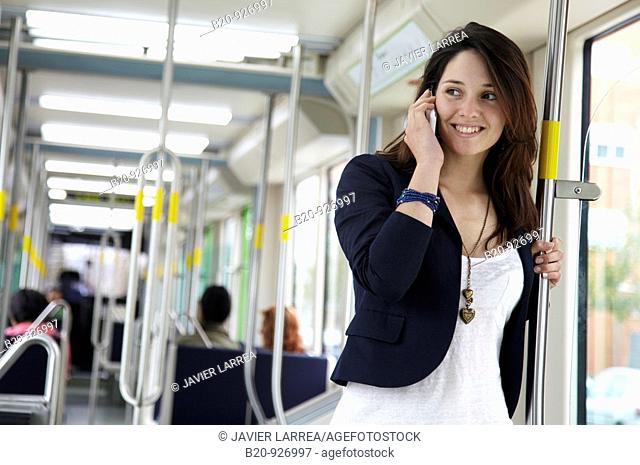 Young woman in tram, Vitoria, Alava, Basque Country, Spain