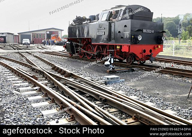02 September 2021, Mecklenburg-Western Pomerania, Bad Doberan: A locomotive of the Molli narrow-gauge railway shunts at the station
