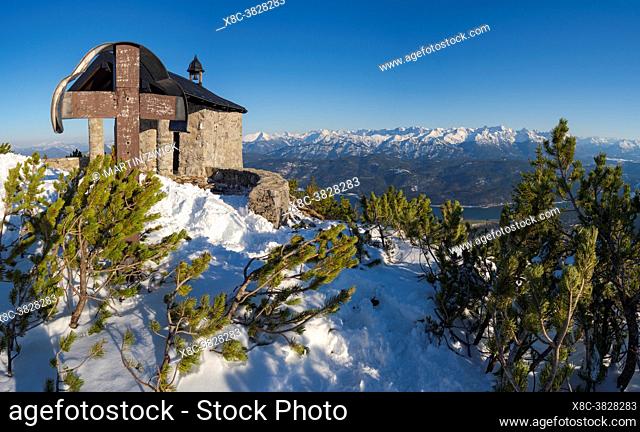 The chapel at Fahrenbergkopf during winter in the bavarian Alps. Europe Germany, Bavaria