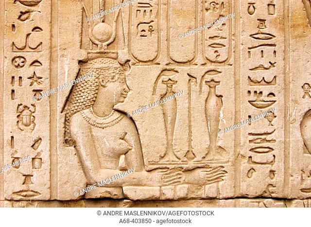 Stone relief  of Isis at the temple of Horus in Edfu. Egypt
