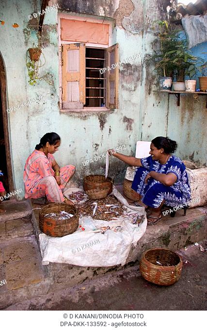 Life style of fisher women at Worli Koliwada , Bombay Mumbai , Maharashtra , India