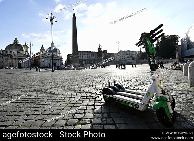 Electric scooters at the Piazza del Popolo. To respect the urban decor, sharing elecrtic scooters will not be allowed to 'park wild' in the squares of the city...