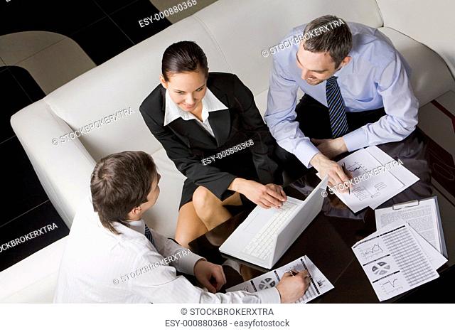 Image of business partners thinking about new project at meeting