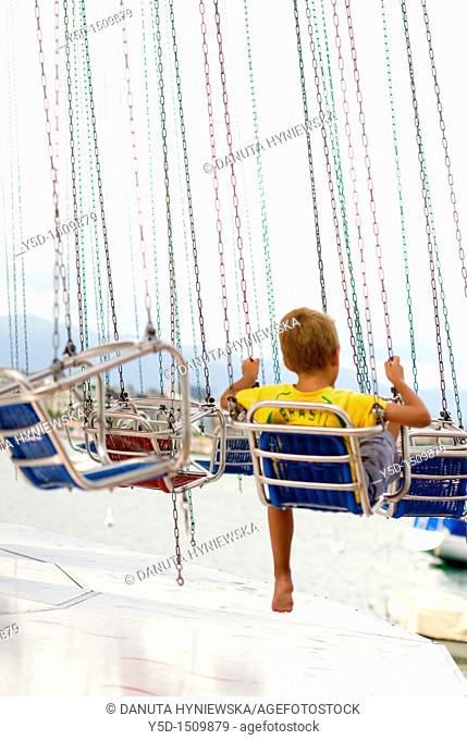 Fetes de Geneve, Days od Geneva, Switzerland, little boy on carousel