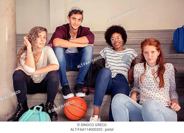 Group of friends hanging out together after school, portrait