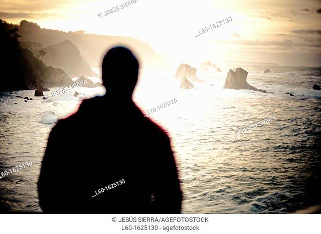 Man in Playa del Silencio, Asturias, Spain