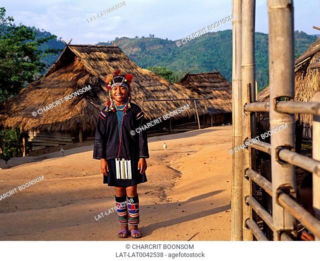 The women of the Akha hill tribe wear traditional dress, with large silver ornaments and jewellery on their headdresses and around their necks