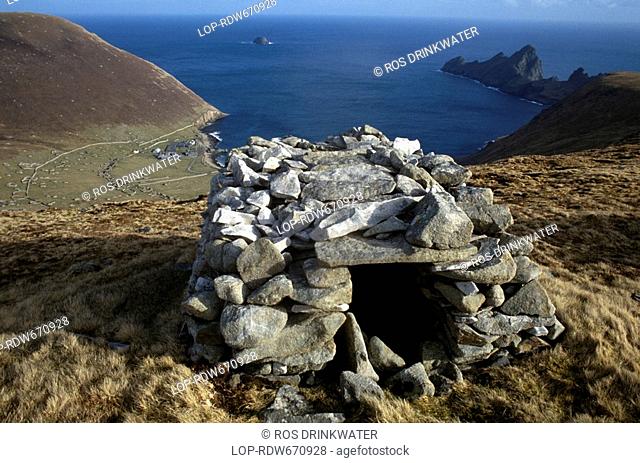 Scotland, Western Isles, St Kilda, A cleit overlooking Village Bay on the island of Hirta, one of four volcanic islands that make up the St Kilda archipelago...