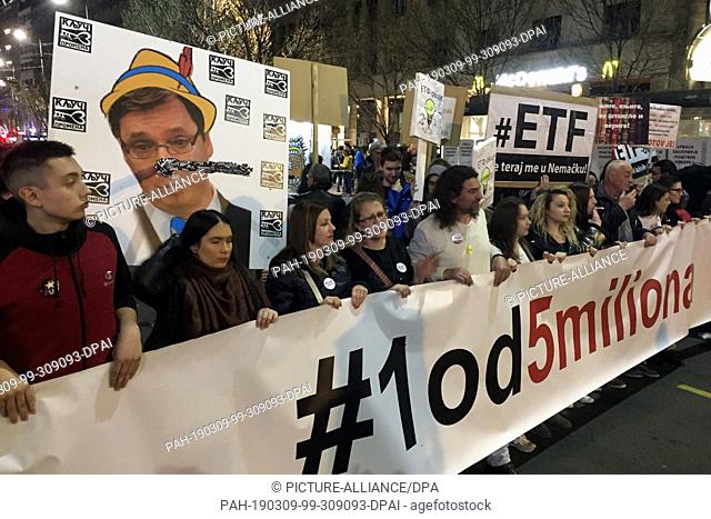 09 March 2019, Serbia, Belgrad: Demonstrators hold a banner with the inscription ""1 of 5 million"" during a protest action against the government of President...