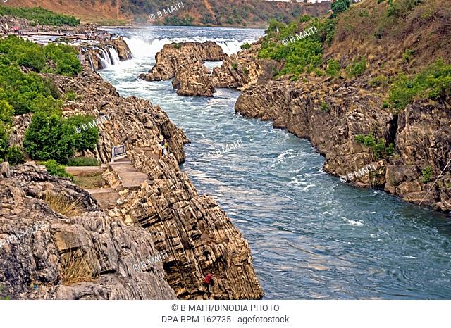 River narmada through marble rocks against Dhuandhar falls ; Bedaghat ; Jabalpur ; Madhya Pradesh ; India