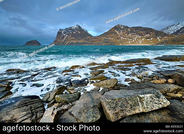 Rocky coast of fjord of Norwegian sea in winter. Lofoten islands, Norway, Europe