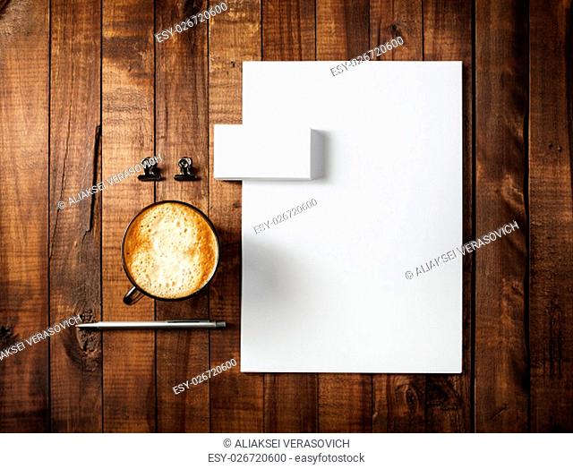 Blank branding identity set on wooden table background. Corporate identity template. For design presentations and portfolios