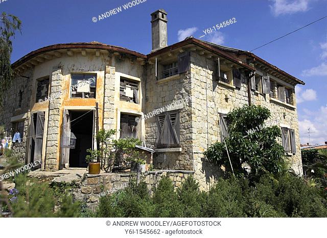 French style stone country house with wooden shutters Dalat south east Vietnam
