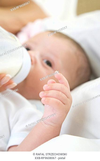 Baby drinking juice
