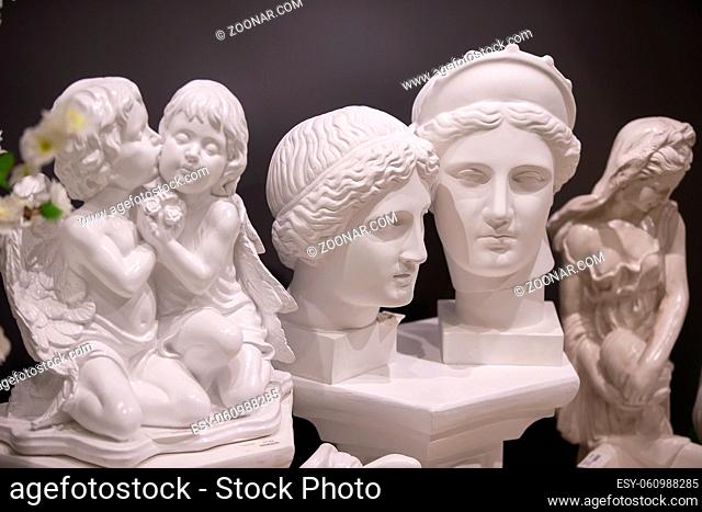 Various plaster sculptures. Plaster head of Venus, angels and Greek goddesses. Sale of plaster sculptures