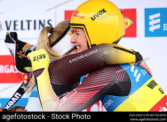 12 February 2023, North Rhine-Westphalia, Winterberg: Luge: World Cup, single, women, 2nd run: Julia Taubitz from Germany is happy after her victorious run...
