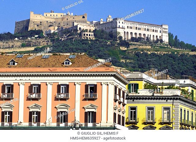 Italy, Campania, Naples, historical centre listed as World Heritage by UNESCO, Castel San elmo and red building of Palazzo di Prefettura view from Plazza...