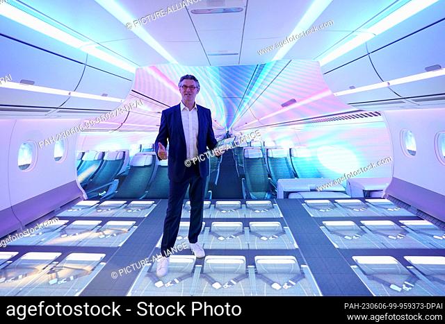 06 June 2023, Hamburg: Ingo Wuggetzer, Head of Cabin Marketing at aircraft manufacturer Airbus, stands in a mock-up of the Airspace cabin of an Airbus A350 at...