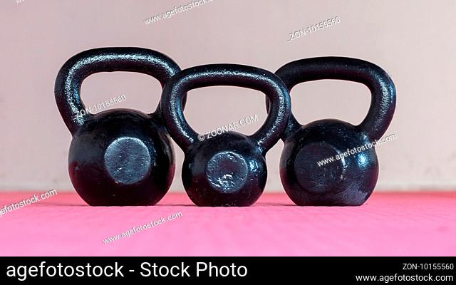 Black kettlebell ina gym - Selective focus