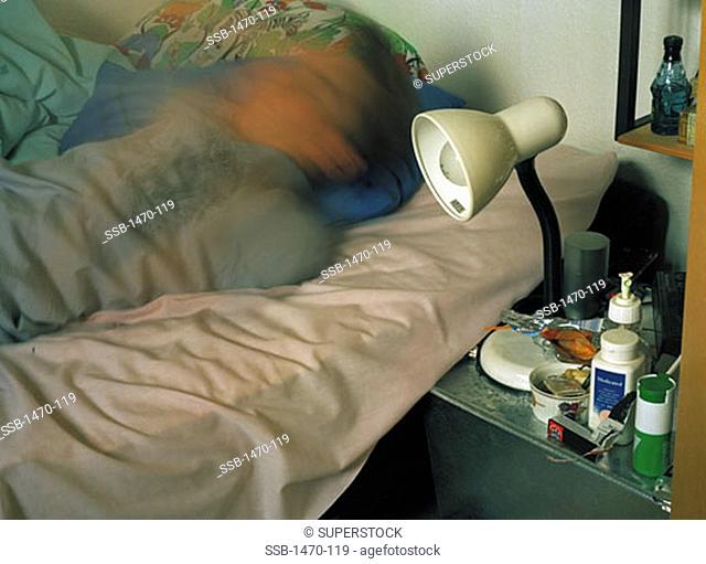 Man sleeping on the bed