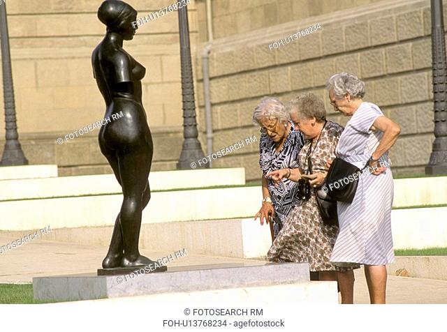 women three eldery seniors looking at nude