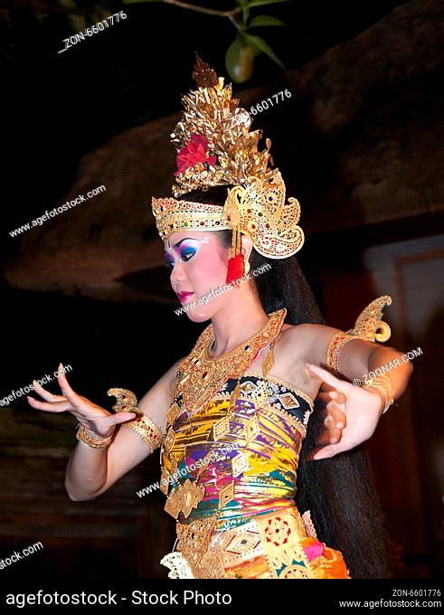 UBUD - 05 April 2011: dancing girl in Ubud Bali dancing for tourist on April 05 2011 in Ubud, Indonesia