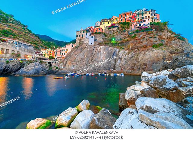 Manarola fishing village in the evening, seascape in Five lands, Cinque Terre National Park, Liguria, Italy