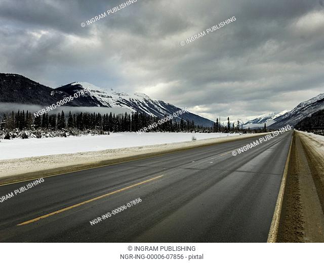 Road passing through snow covered landscape, Regional District of Fraser-Fort George, Highway 16, Yellowhead Highway, British Columbia, Canada